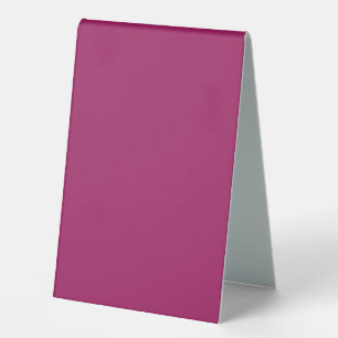 a pink background with a white border