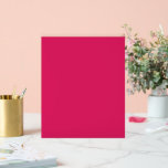 a pink background with a white border acrylic sign<br><div class="desc">The design is a large blue square,  which appears to be a bright and clear sky. The colour of the sky is a deep shade of blue,  giving it a vibrant and lively appearance.</div>