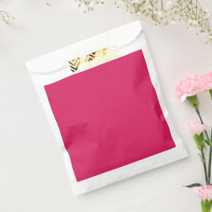 a pink background with a white border favour bags