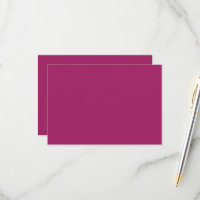 a pink background with a white