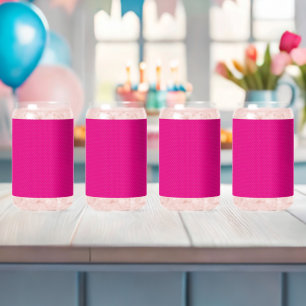 a pink background with white polka dots can glass