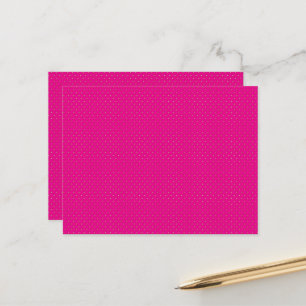 a pink background with white polka dots postcard