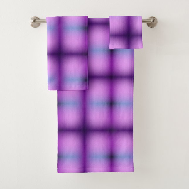 A plaid-patterned towel set with a vibrant purple (Insitu)