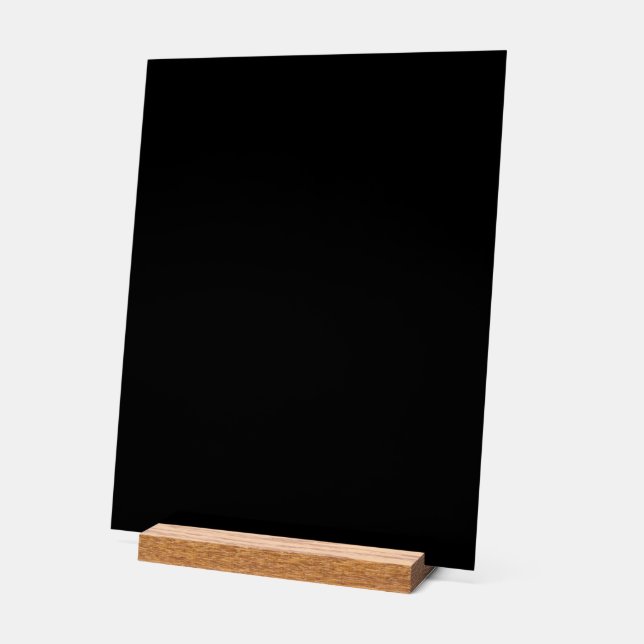 A plain dark grey textured fabric fills the frame acrylic sign (Angle)