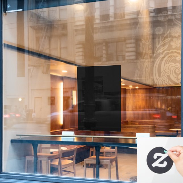 A plain dark grey textured fabric fills the frame window cling (Cafe Window)
