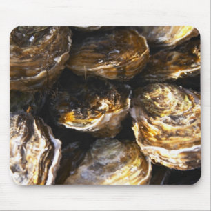 A plate of oysters. mouse mat