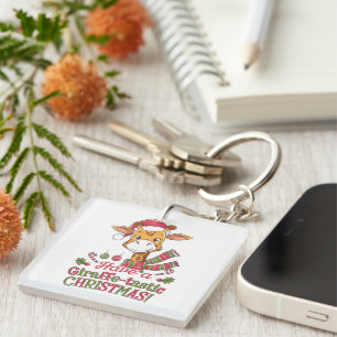 A playful christmas giraffe key ring