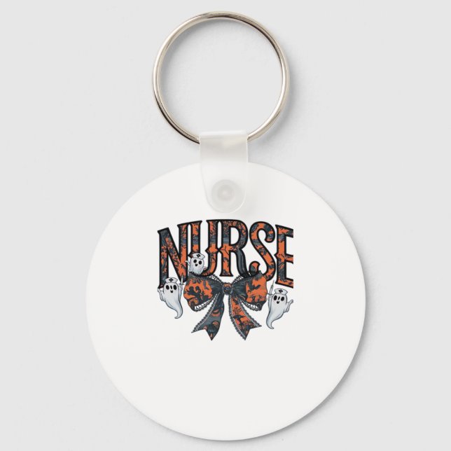 A playful design featuring a pumpkin witch with a  key ring (Front)