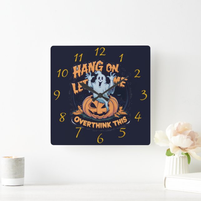 A playful ghost overthinking by a carved pumpkin square wall clock (Home)