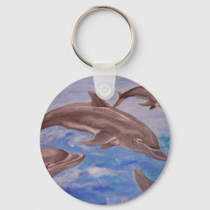 A Pod of Playful Jumping Dolphins Key Ring