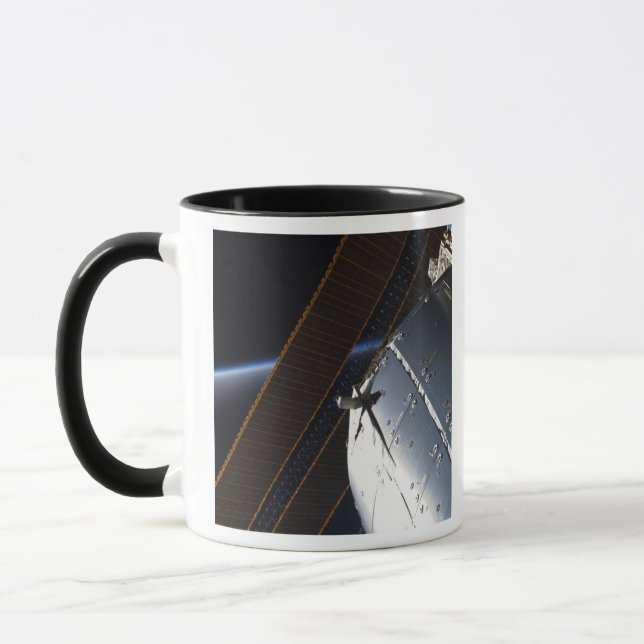 A portion of the International Space Station Mug (Left)