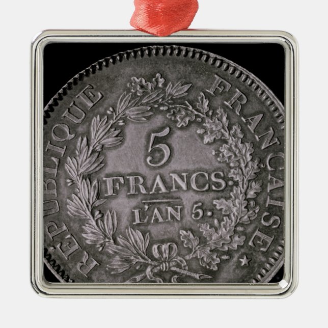 A pound of twenty sols metal tree decoration (Front)