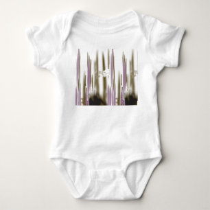 A pristine lake nestled among snow-capped mountain baby bodysuit