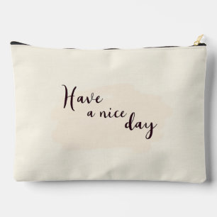 A product with a design of "Have a nice day" Accessory Pouch