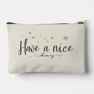 A product with a design of "Have a nice day" Accessory Pouch