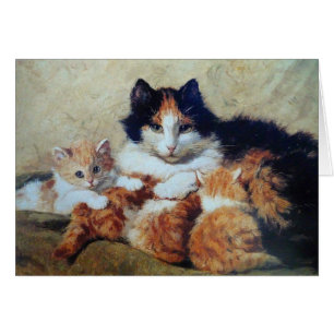 A Proud Mother - A Cat with her Yellow Kittens