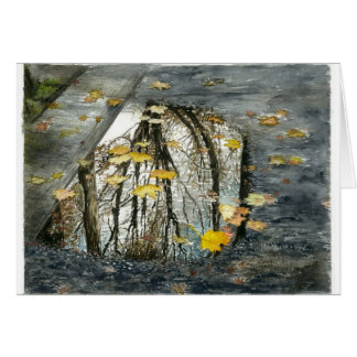 A puddle on the street in November