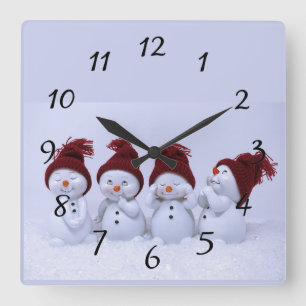 A quartet of snowmen square wall clock