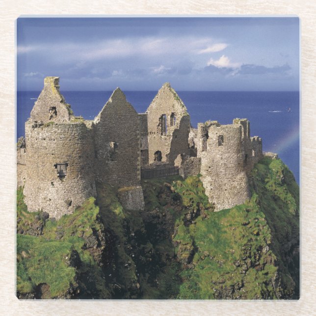 A rainbow strikes mediaeval Dunluce Castle Glass Coaster (Front)