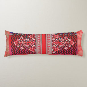 a red and black painting with a red heart on it body cushion
