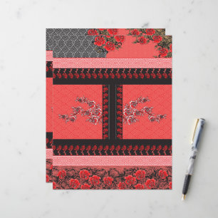 a red and black pattern with flowers on it