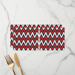 a red and black zigzag pattern on a white backgrou menu