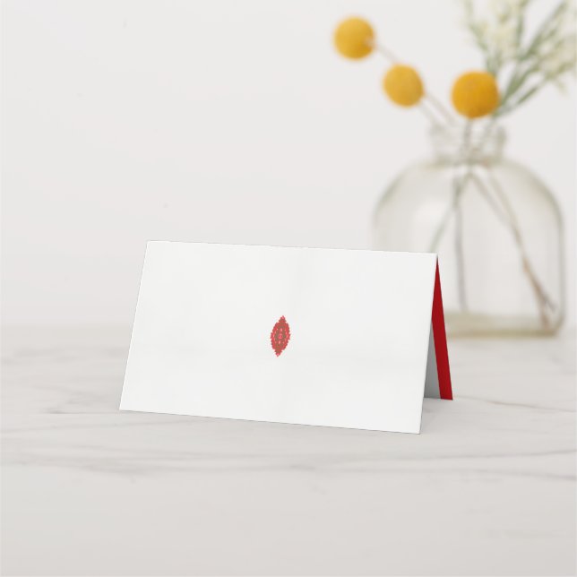 a red and brown design on a white background place card (Front)