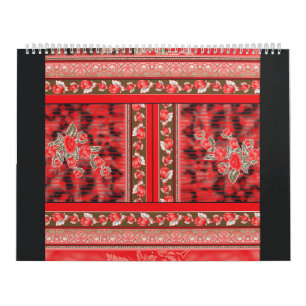 a red and green floral design on a black backgroun calendar
