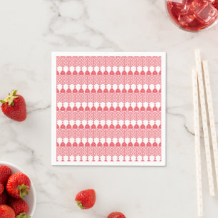 A red and pink geometric pattern featuring interlo napkin