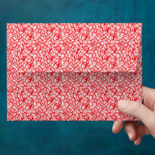 a red and white background with a pattern envelope