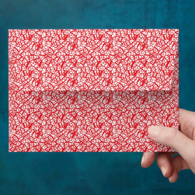 a red and white background with a pattern envelope (Hand)