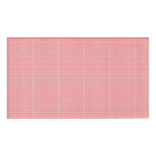 a red and white background with a pattern name tag