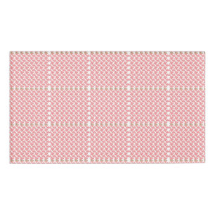 a red and white flower pattern on a white backgrou name tag
