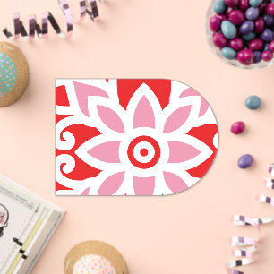 a red and white pattern with a flower on it acrylic invitations