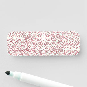 a red and white wallpaper with a pattern on it name tag