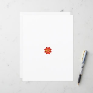 a red and yellow flower with black dots