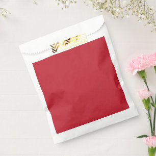 a red background with a favour bags