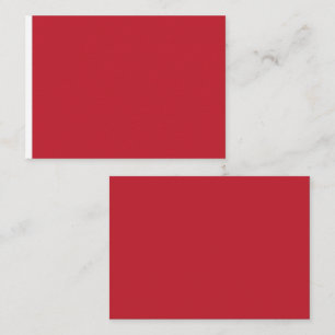 a red background with a place card