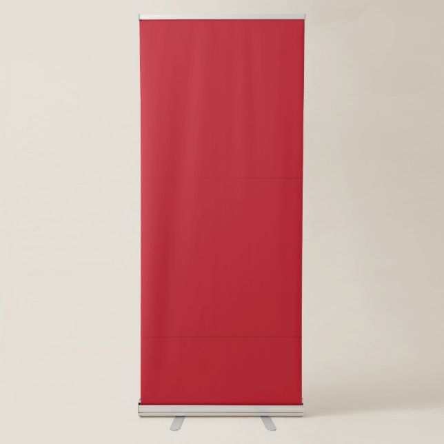 a red background with a retractable banner (Front)