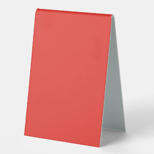 a red background with a white border
