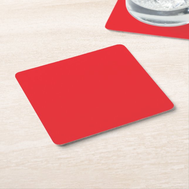 a red background with a white border square paper coaster (Angled)