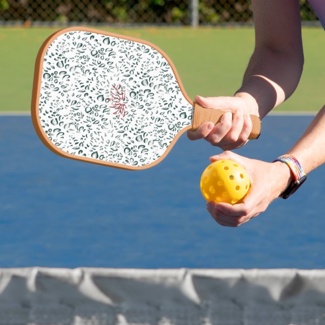 a red flower on a black background pickleball paddle (Insitu)