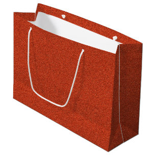 A red glittery paper shopping bag