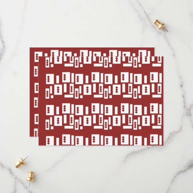 A red rug with a textured pattern is spread out on save the date (Front/Back In Situ)