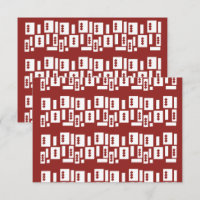 A red rug with a textured pattern is spread out on
