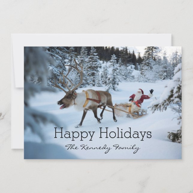 A reindeer pulling Santa Claus and his sleigh Holiday Card (Front)