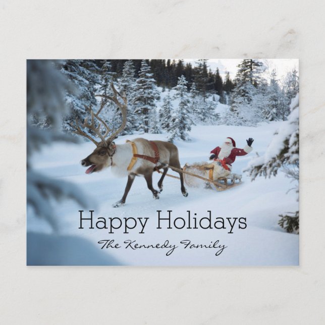 A reindeer pulling Santa Claus and his sleigh Holiday Postcard (Front)