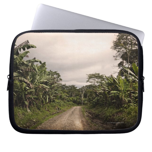 A remote jungle road laptop sleeve (Front)