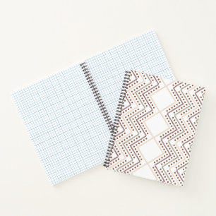 A repeating geometric pattern with diamond shapes  notebook