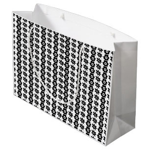 A repeating pattern of interconnected circles and  large gift bag